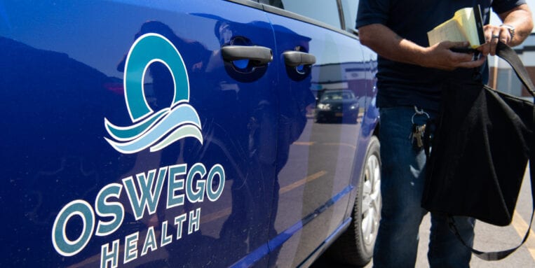 A mobile unit is prepping to respond to a crisis for Oswego Behavioral Health.