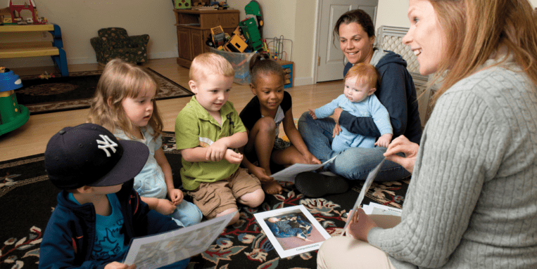 At Child Care Solutions, children study with their teacher.