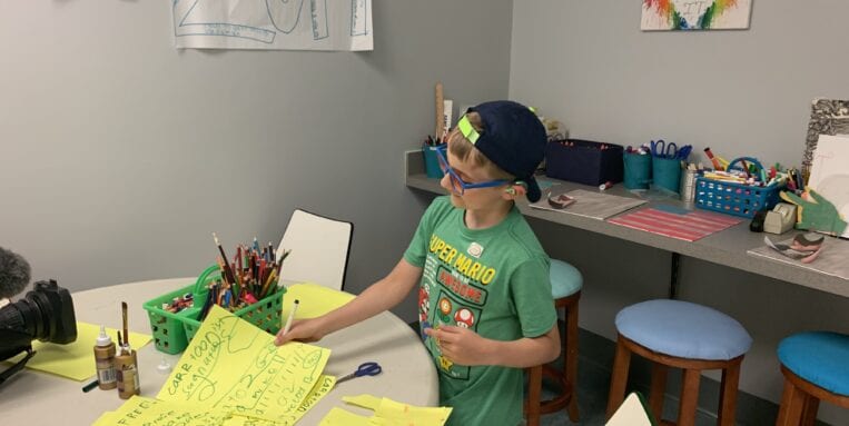 A child creating arts and crafts.