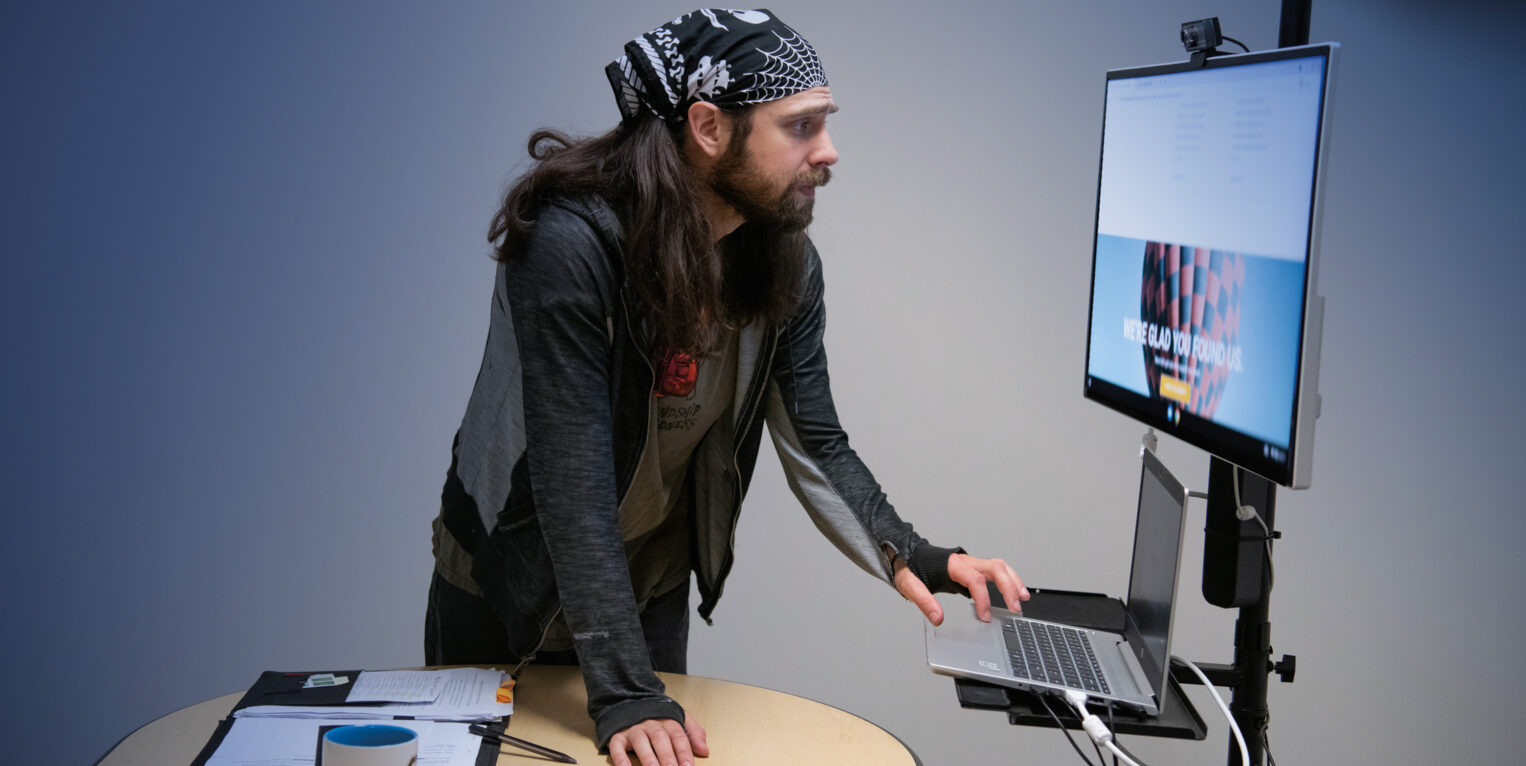 Man looking at computer screen