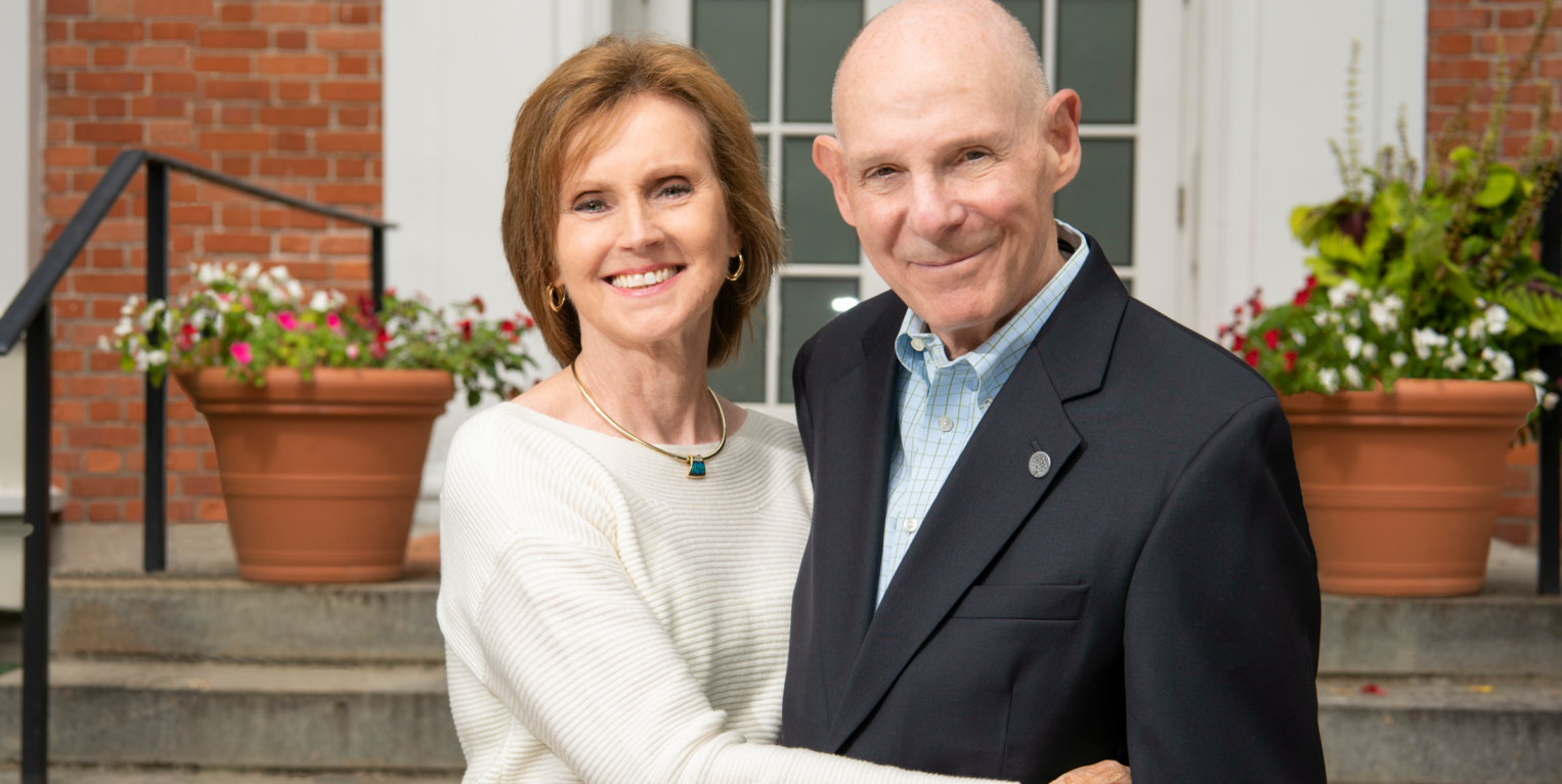 Steve and Elaine Jacobs stand in front of the CNY Philanthropy Center.