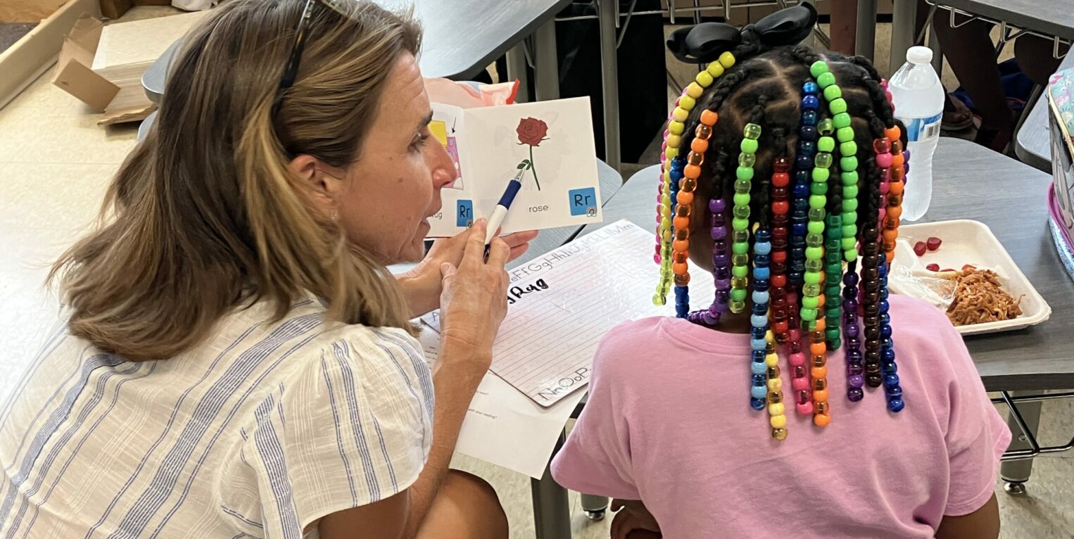 Woman reading to child